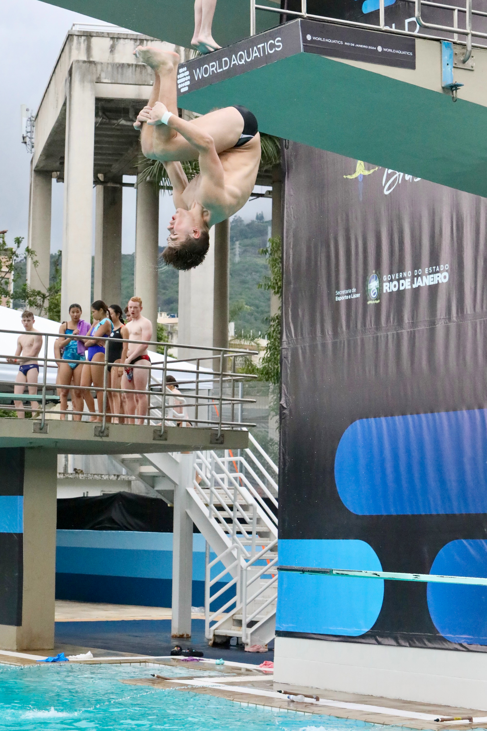 Nathaniel performs a reverse tuck dive during the Junior World Championships in November.