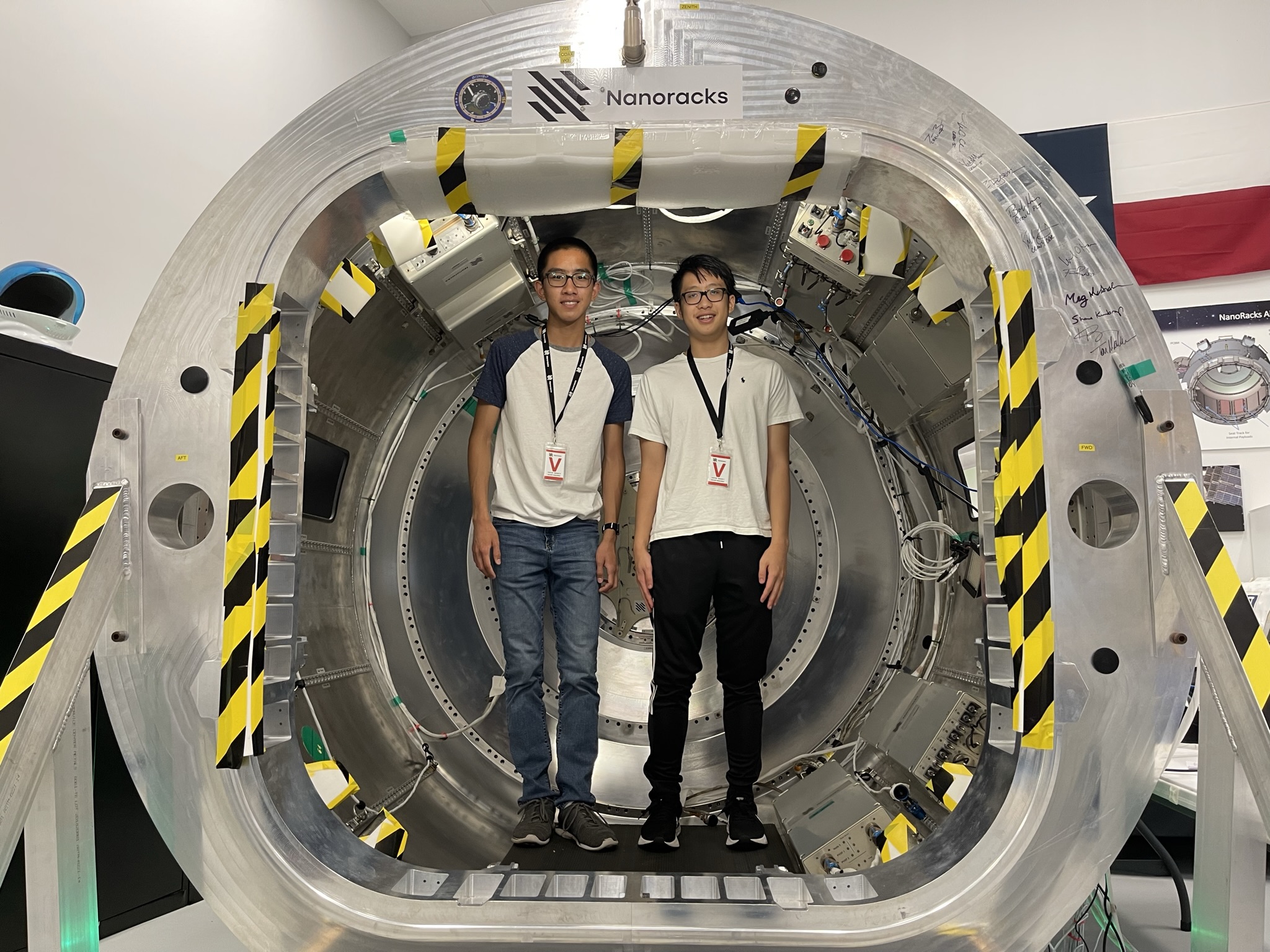 Alan Hsu and Khoi Dinh at Nanoracks near the Johnson Space Center in Houston to deliver TJ REVERB